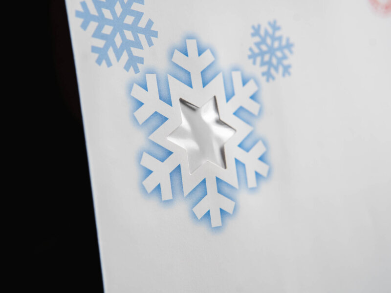 Snowflake cut out on envelope detail