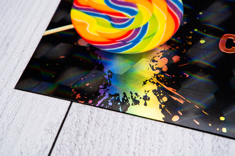 Cast and cure rainbow splatter effect on envelope