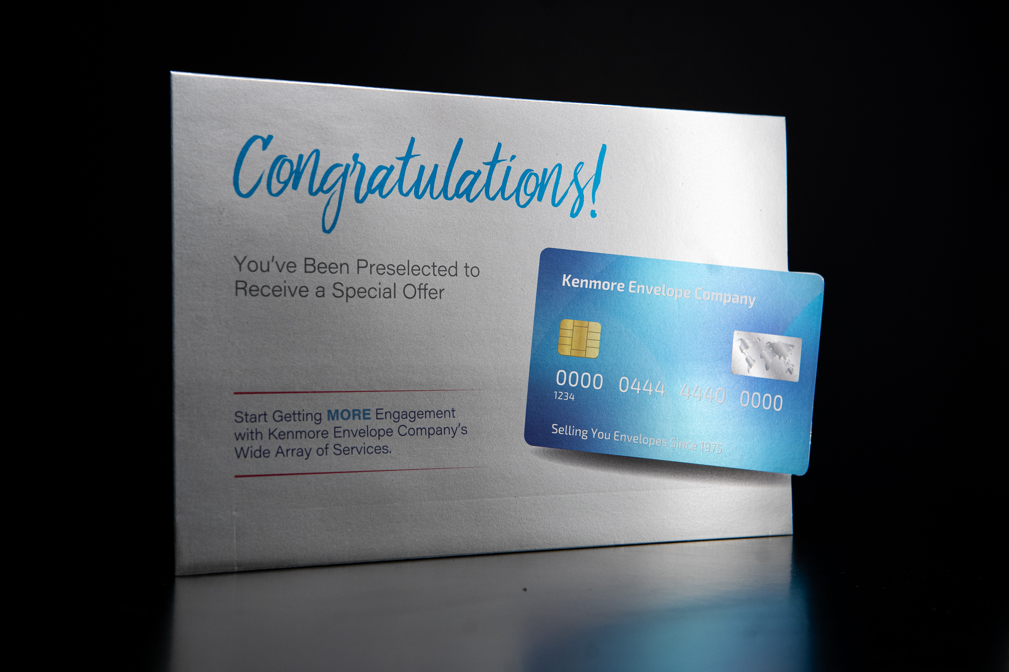 Envelope with Cut Out feature for highlighting credit cards in the mail